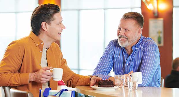 Two men having a cup of coffee in Bar Naissaar.