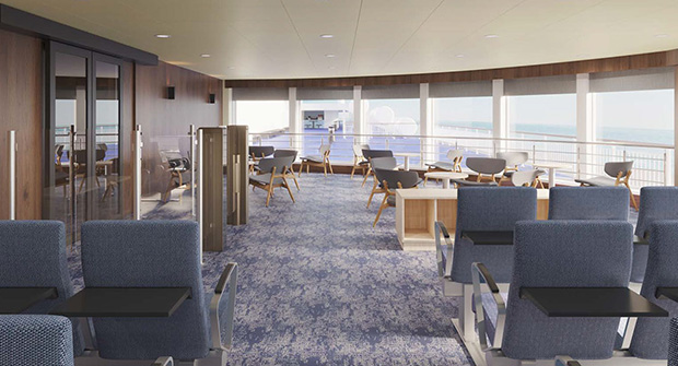 A row of seats on a ship. The windows offer a view of the sea.