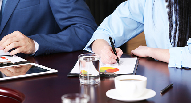 Woman writing notes.